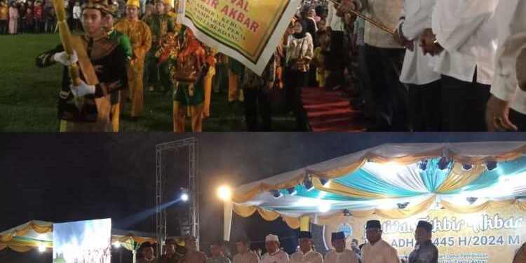Pj Gubsu diwakili Sekretaris DPRD Sumut Dr Zulkifli SIP MM bersama anggota DPRD Sumut Wagirin Arman selaku pemrakarsa kegiatan dan Forkopimda, Forkopimca saat pembukaan Festival Takbir Akbar dan Pawai Obor di di Lapangan Desa Klambir V Kebun, Kecamatan Hamparan Perak, Kabupaten Deli Serdang, Sumatera Utara, Minggu (16/06/24) malam.