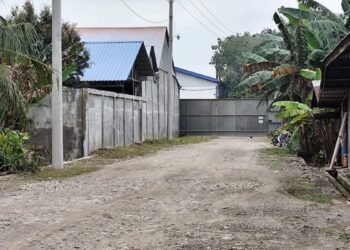 Oknum Perwira Polsek Sunggal Diduga Backup Gudang Pupuk Ilegal di Langkat
